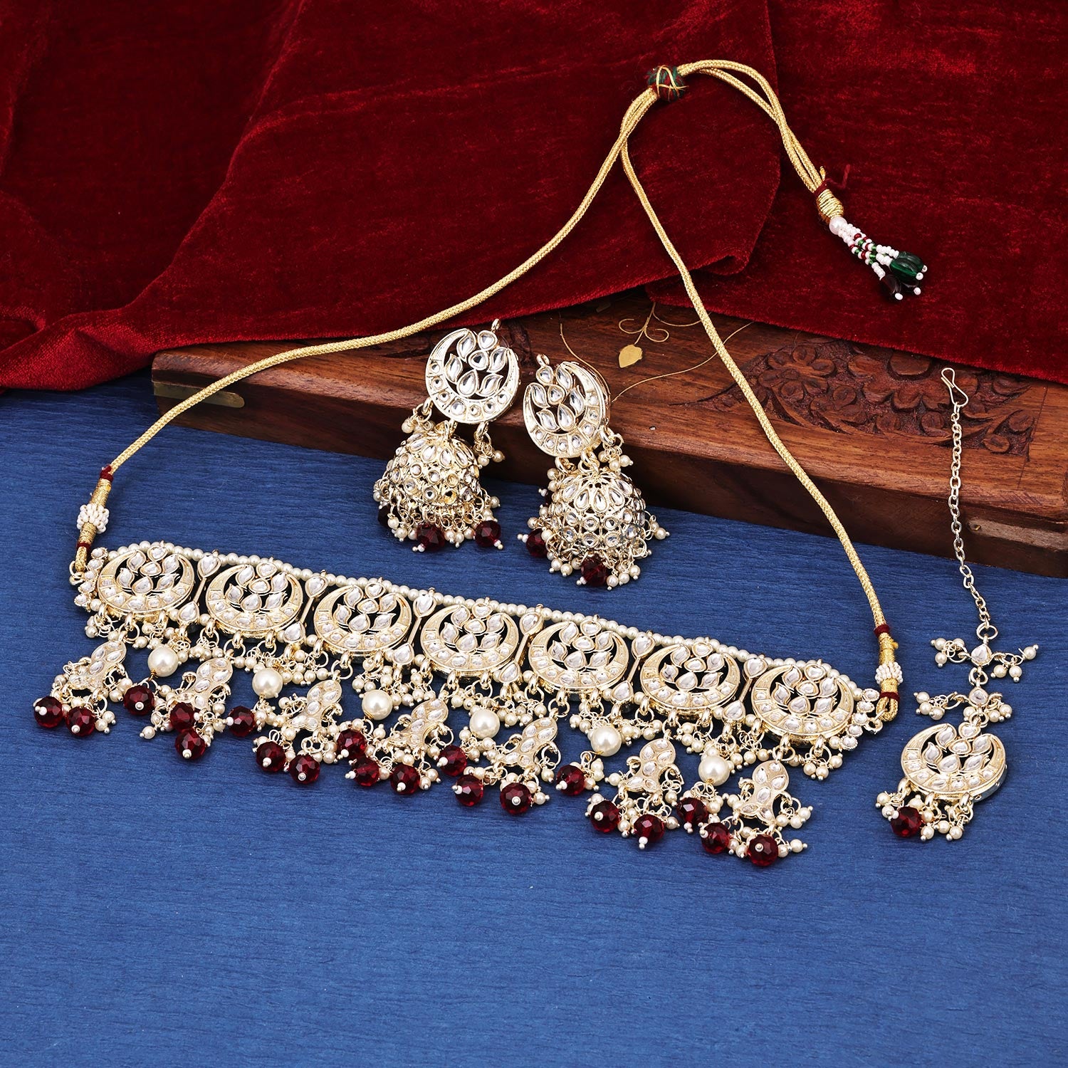 Sukkhi prepossessing Maroon Kundan & Pearl Gold Plated Choker Necklace Set for Women