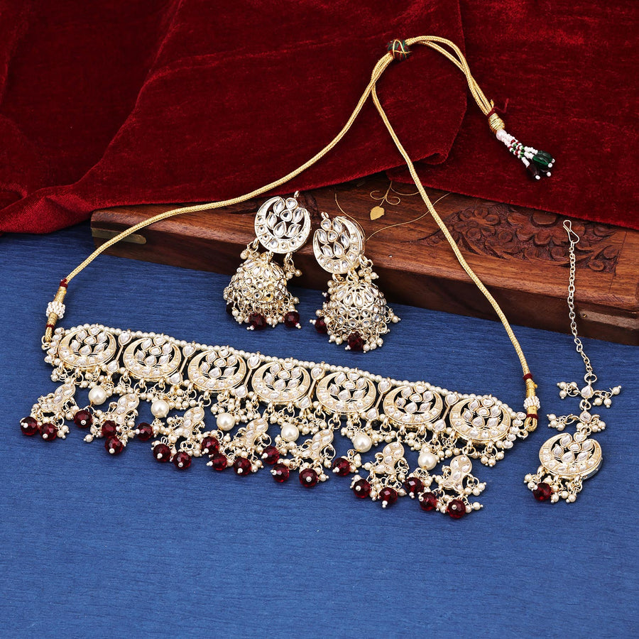 Sukkhi prepossessing Maroon Kundan & Pearl Gold Plated Choker Necklace Set for Women
