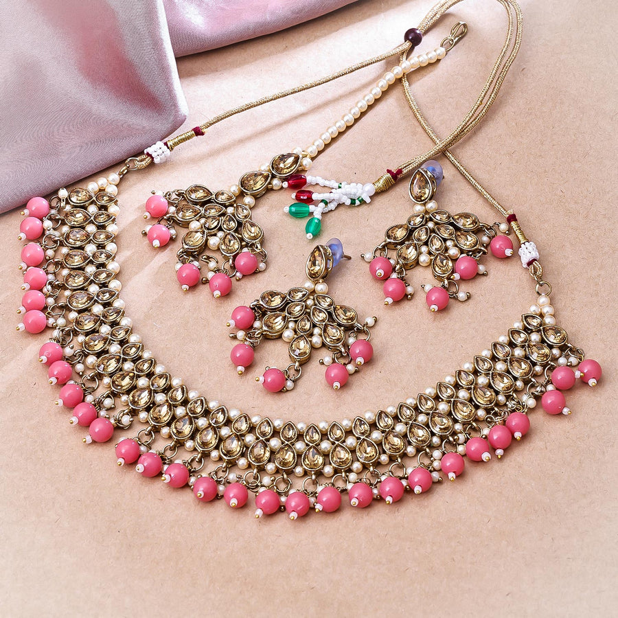 Sukkhi Dazzling Gold Plated Reverse AD & Pearl Peach Necklace Set for Women