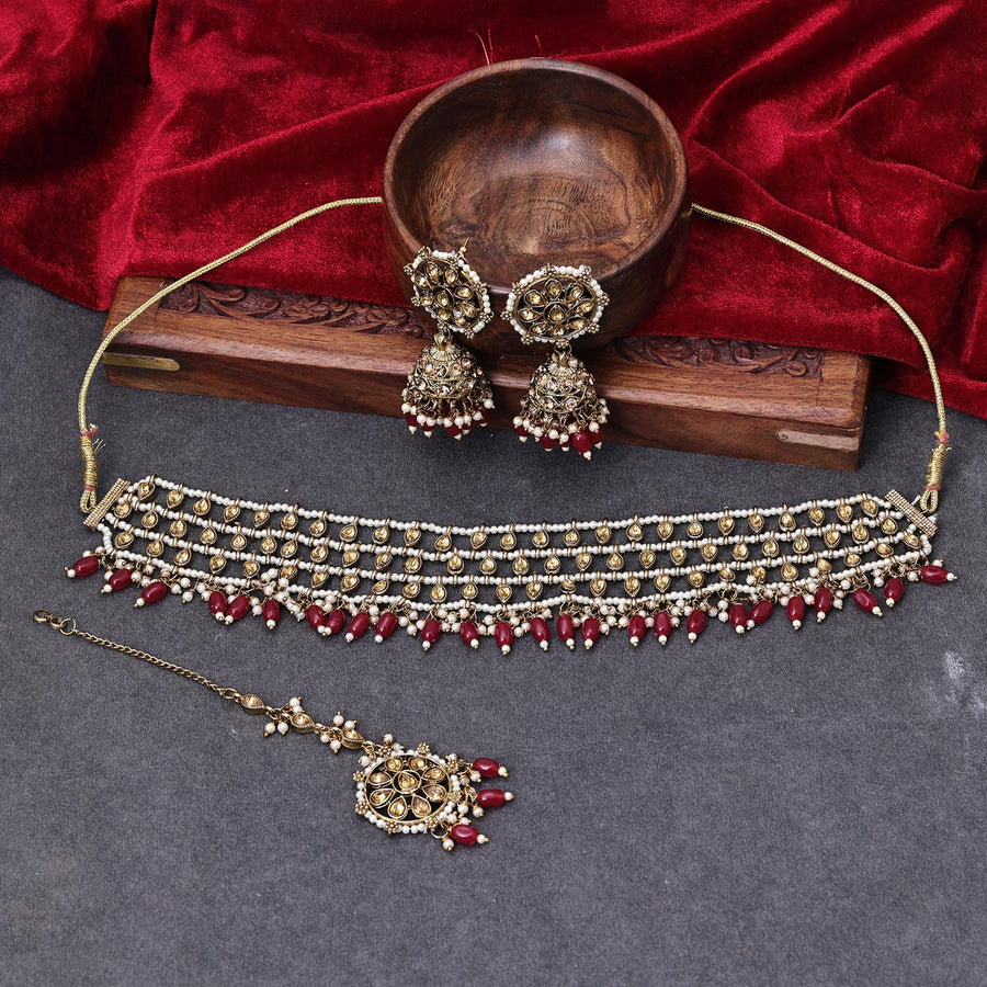 Sukkhi Ethnic Gold Plated Reverse AD & Pearl Red Necklace Set for Women