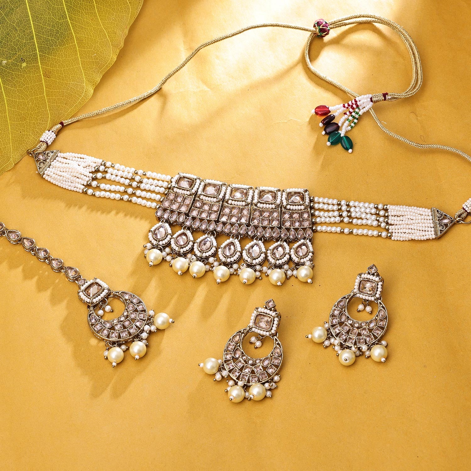 Sukkhi Glorious Gold Plated Reverse AD & Pearl Golden Necklace Set for Women