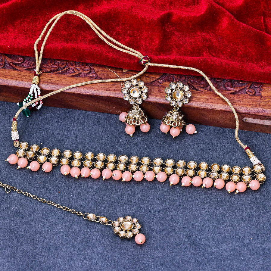 Sukkhi Delicate Gold Plated Reverse AD & Pearl Peach Necklace Set for Women