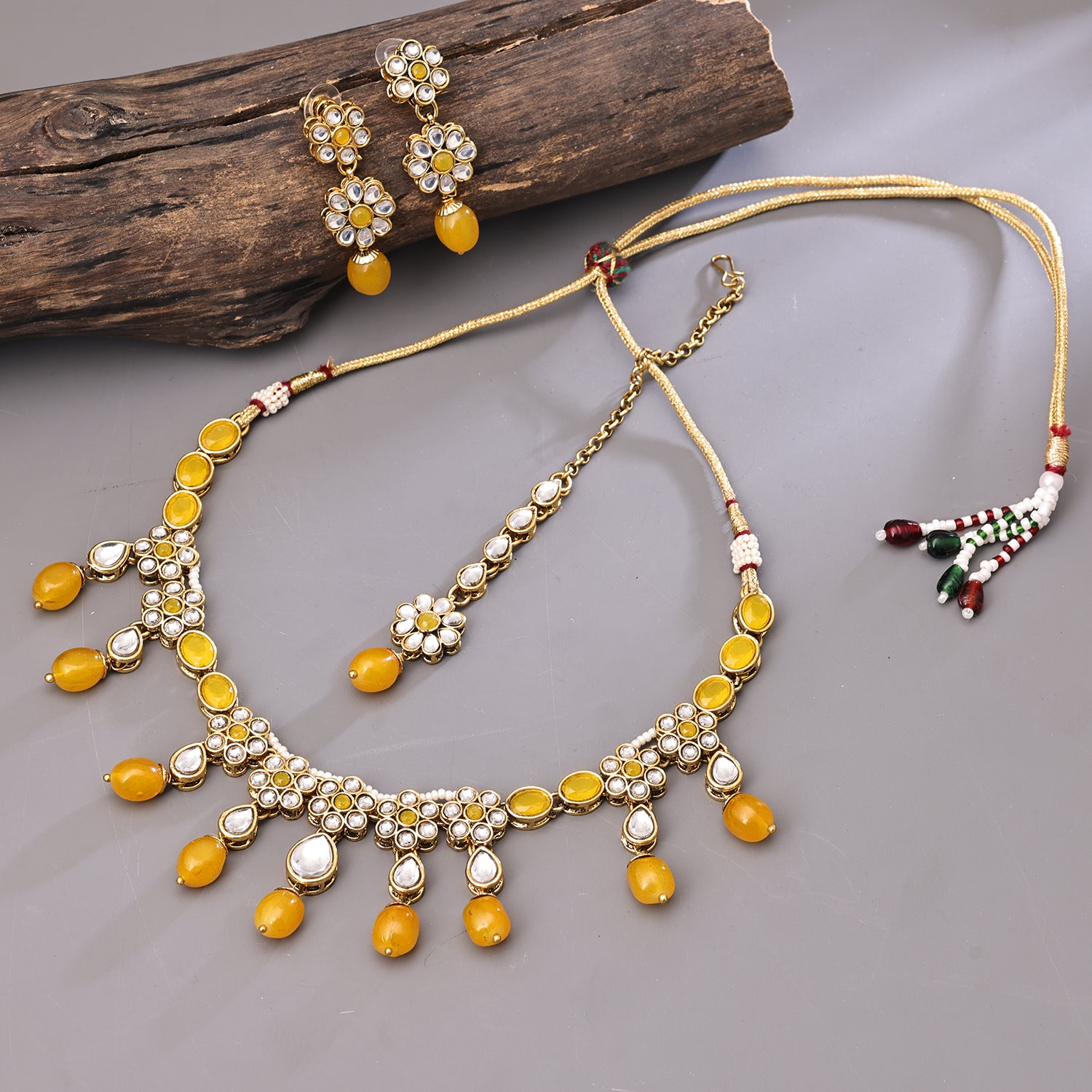 Sukkhi Gold Plated Yellow Kundan Pearl Choker Necklace Set for
