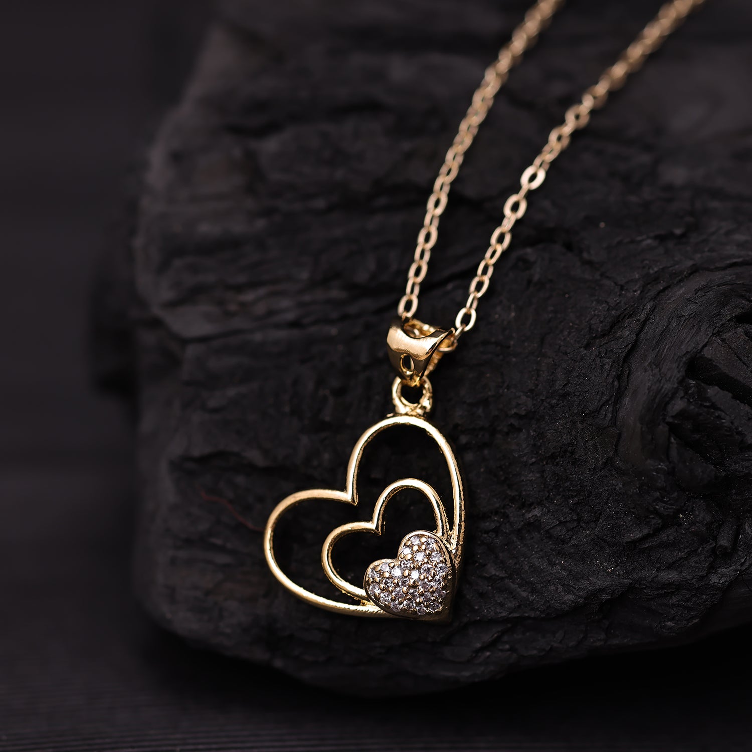 Sukkhi Gold Plated Golden CZ Heart Chain Pendant for Women