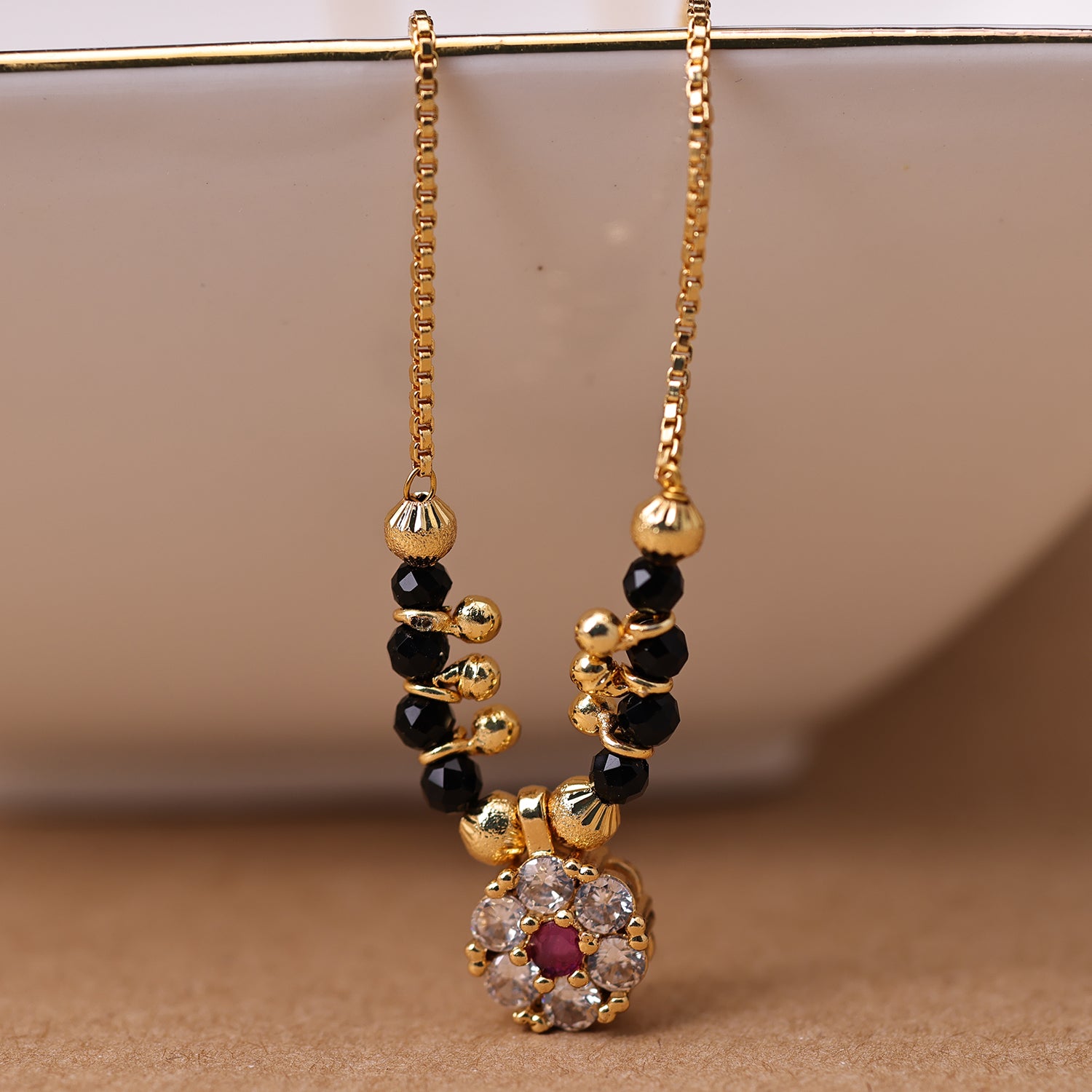 Sukkhi Gold Plated Golden Black Beads Long Mangalsutra Pendant for