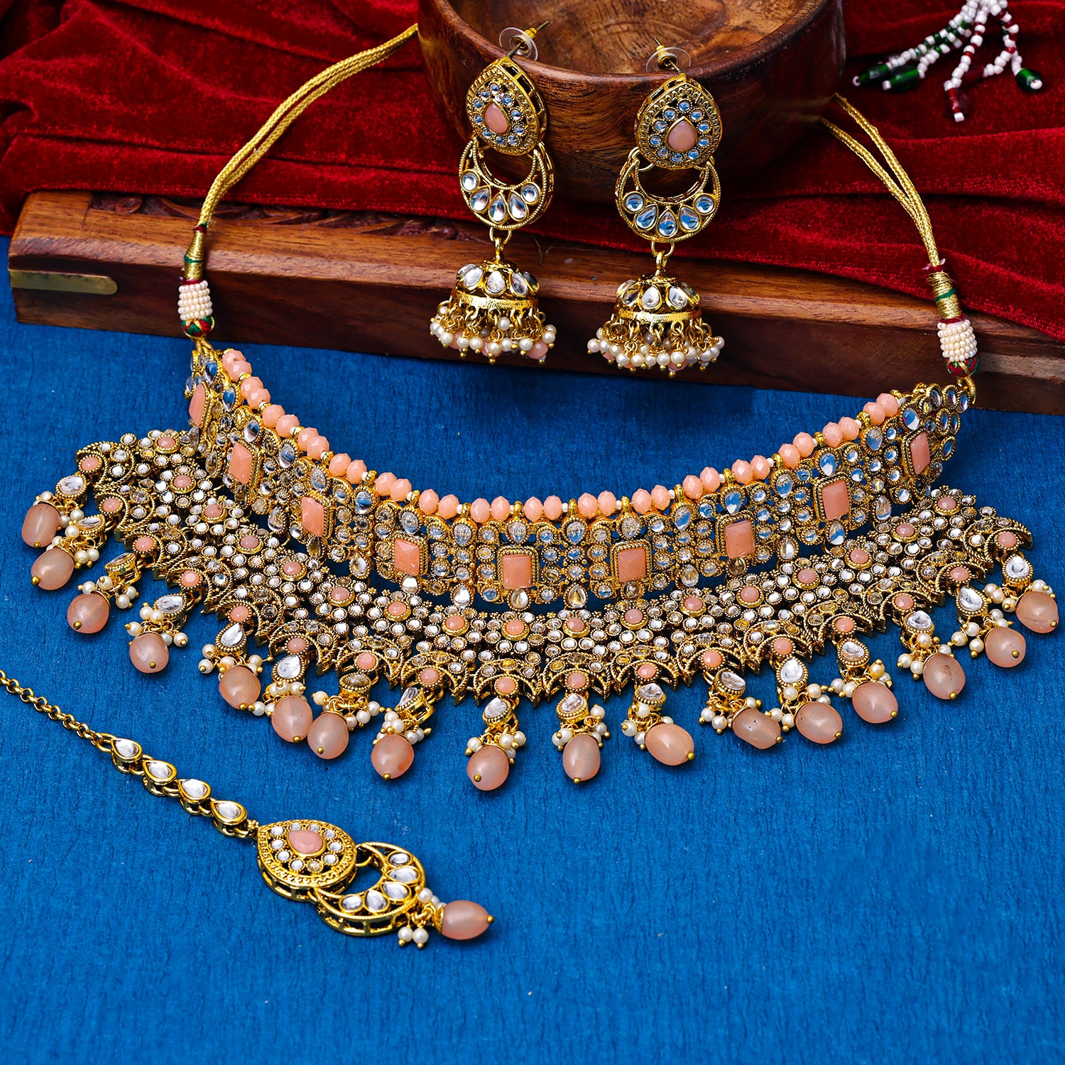 Sukkhi Gold Plated Peach Kundan Pearl Choker Necklace Set for Women