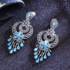 Sukkhi Exciting Blue Rhodium Plated Cz Dangler Earring For Women