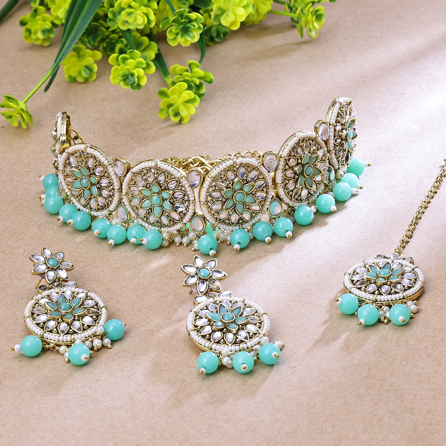 Sukkhi Gold Plated Color Stone & Kundan Aqua Blue Choker Round Necklace Set for Women