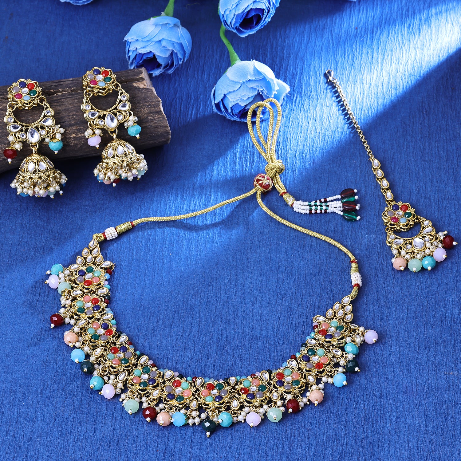 Sukkhi Interesting Gold Plated Multicolor Color Stone Choker Necklace Set With Maang Tikka for Women