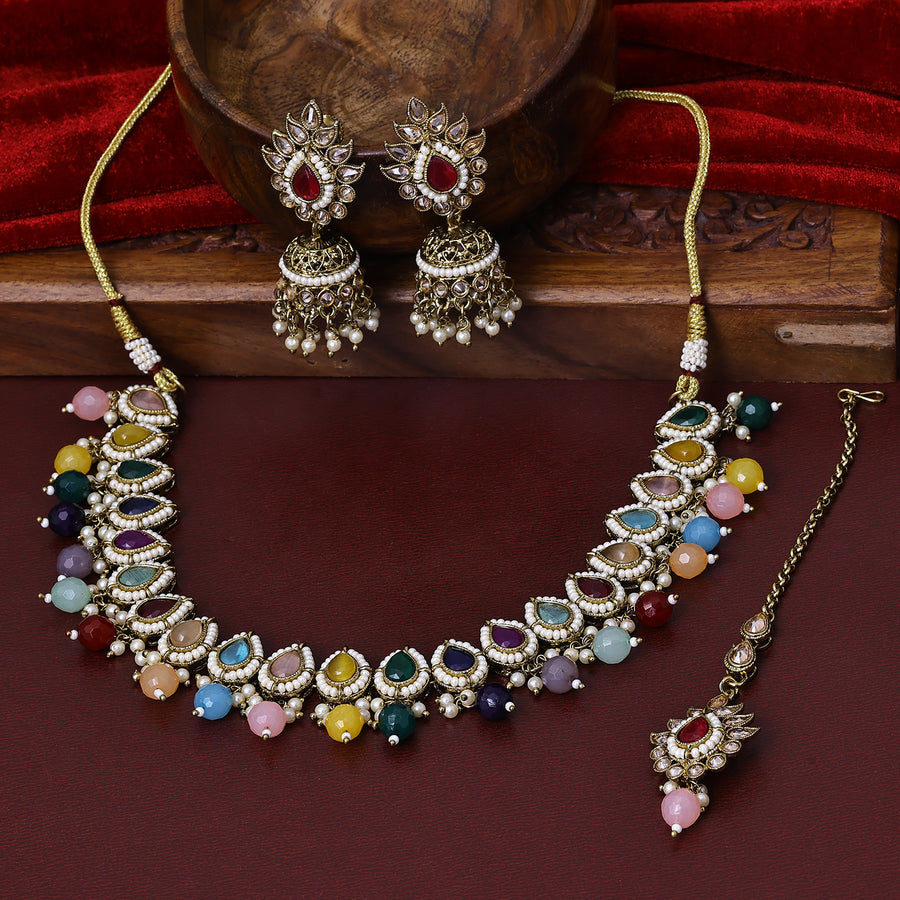 Sukkhi Captivating Gold Plated Multicolor Color Stone Choker Necklace Set With Maang Tikka for Women