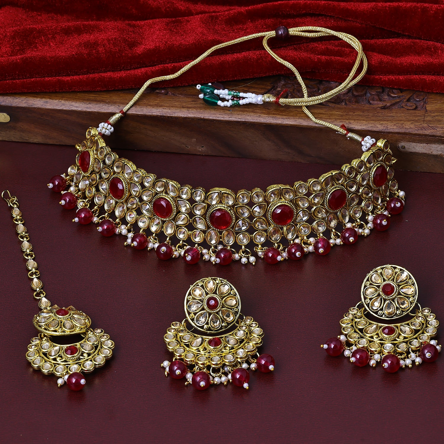 Sukkhi Charismatic Gold Plated Red Color Stone Collar Necklace Set With Maang Tikka for Women