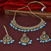 Sukkhi Entrancing Gold Plated Sky Blue Pearl Choker Necklace Set With Maang Tikka for Women