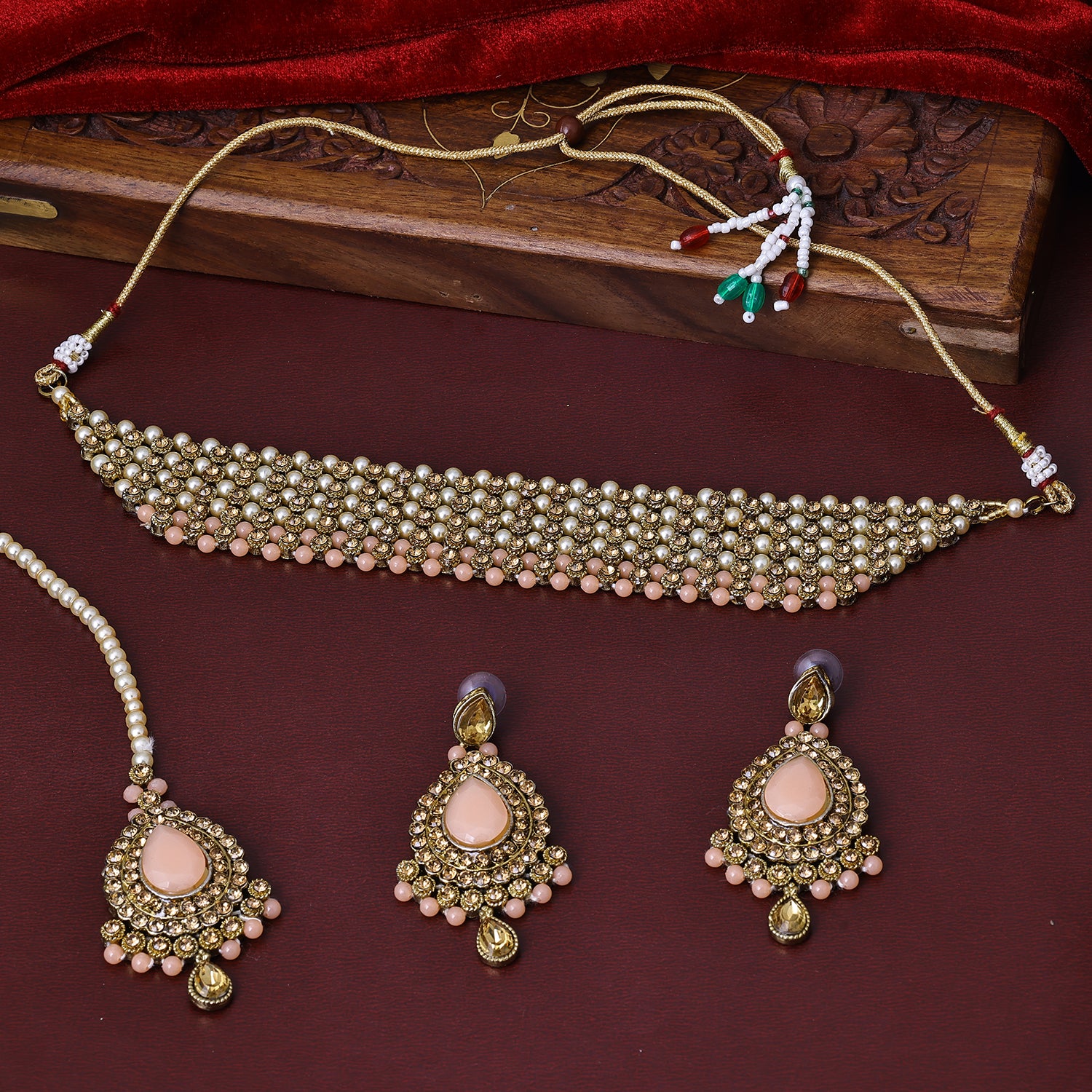 Sukkhi Magnetic Gold Plated Light Pink Austrian Stone Choker Necklace Set With Maang Tikka for Women