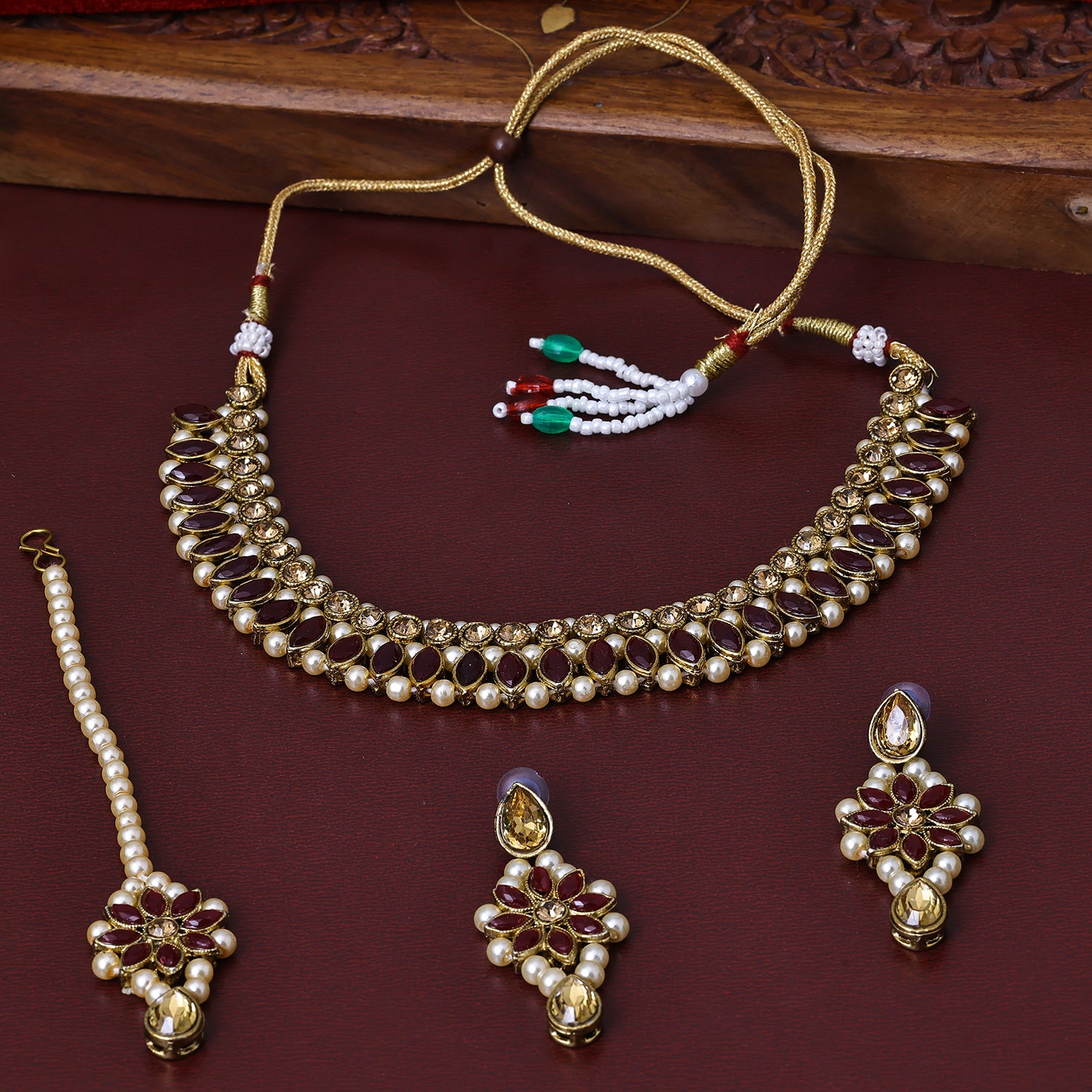 Sukkhi Comely Gold Plated Golden Color Stone Choker Necklace Set With Maang Tikka for Women