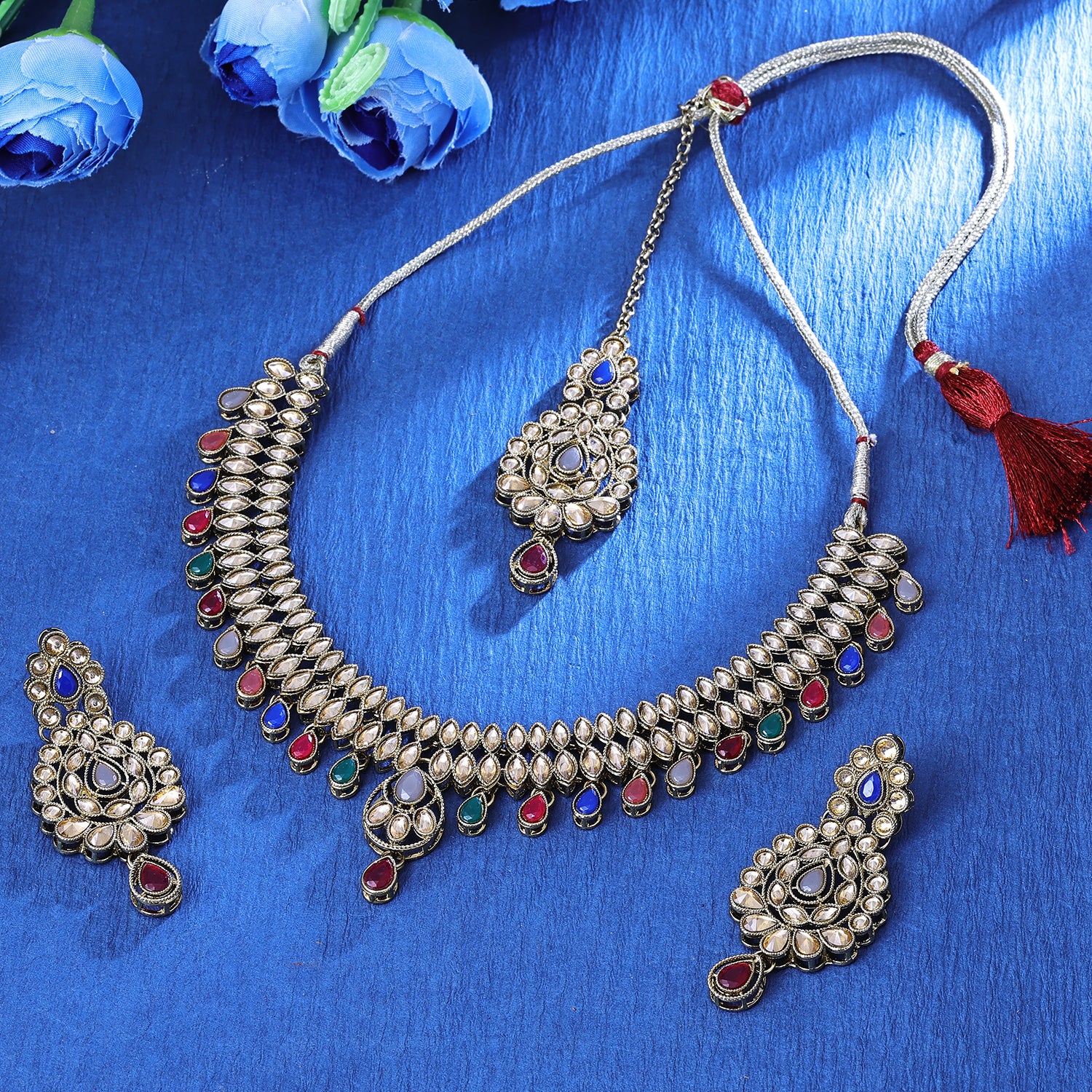 Sukkhi Superb Gold Plated Multicolor Austrian Stone Choker Necklace Set With Maang Tikka for Women