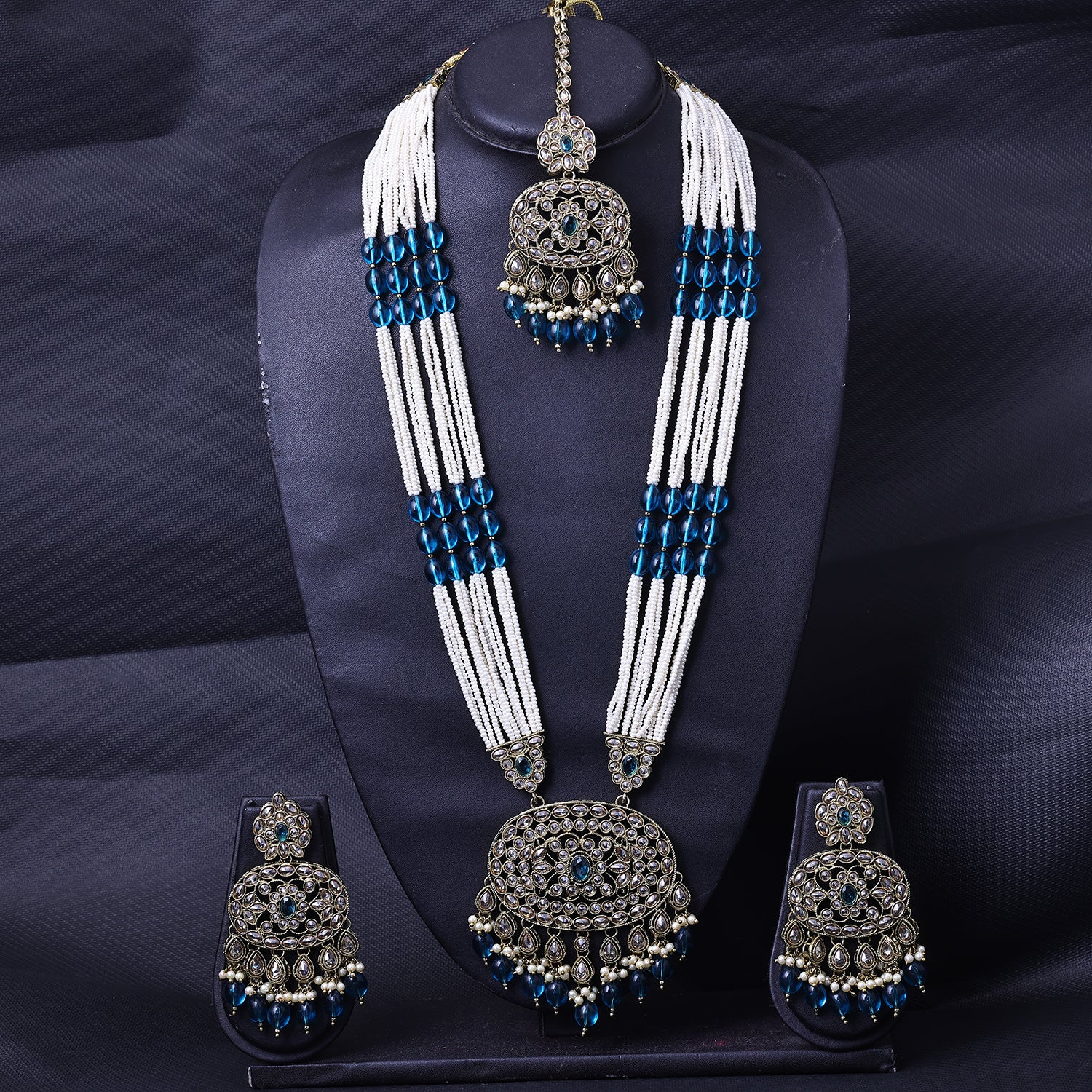 Sukkhi Dainty Gold Plated Blue & White Kundan Long Haram Necklace Set With Maang Tikka for Women