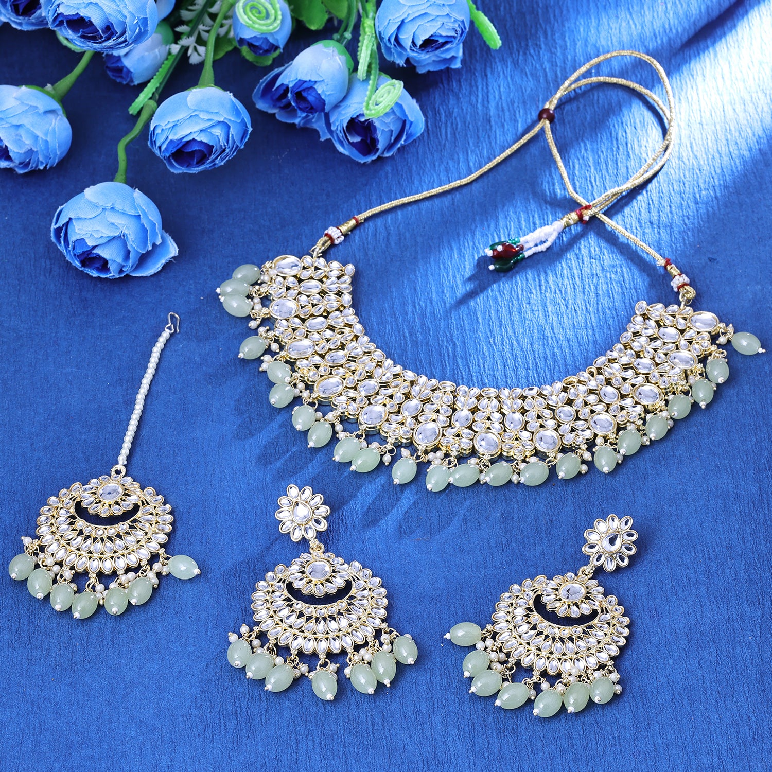 Sukkhi Delicate Gold Plated White Crystal Collar Necklace Set With Maang Tikka for Women