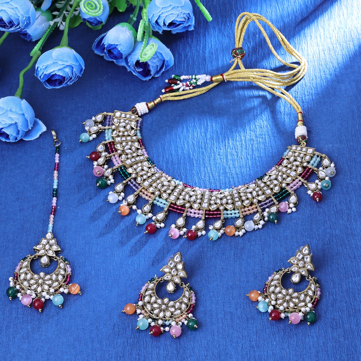 Sukkhi Flashy Gold Plated Multicolor Crystal & Color Stone Collar Necklace Set With Maang Tikka for Women