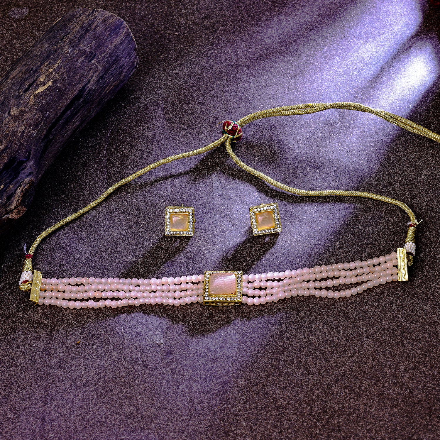 Sukkhi Enticing Gold Plated Peach Crystal Choker Necklace Set for Women