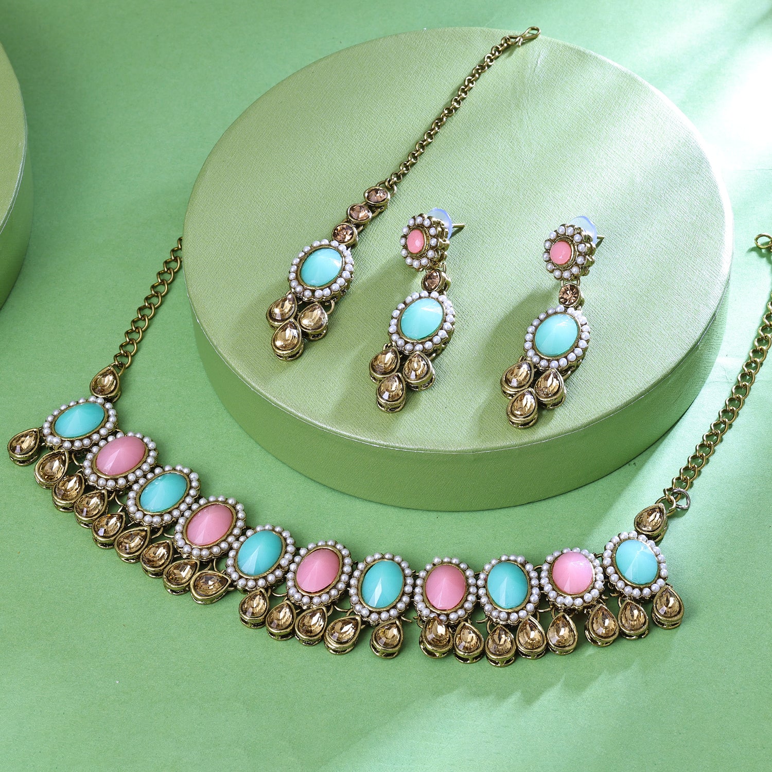 Sukkhi Exciting Gold Plated Multicolor Color Stone Choker Necklace Set With Maang Tikka for Women