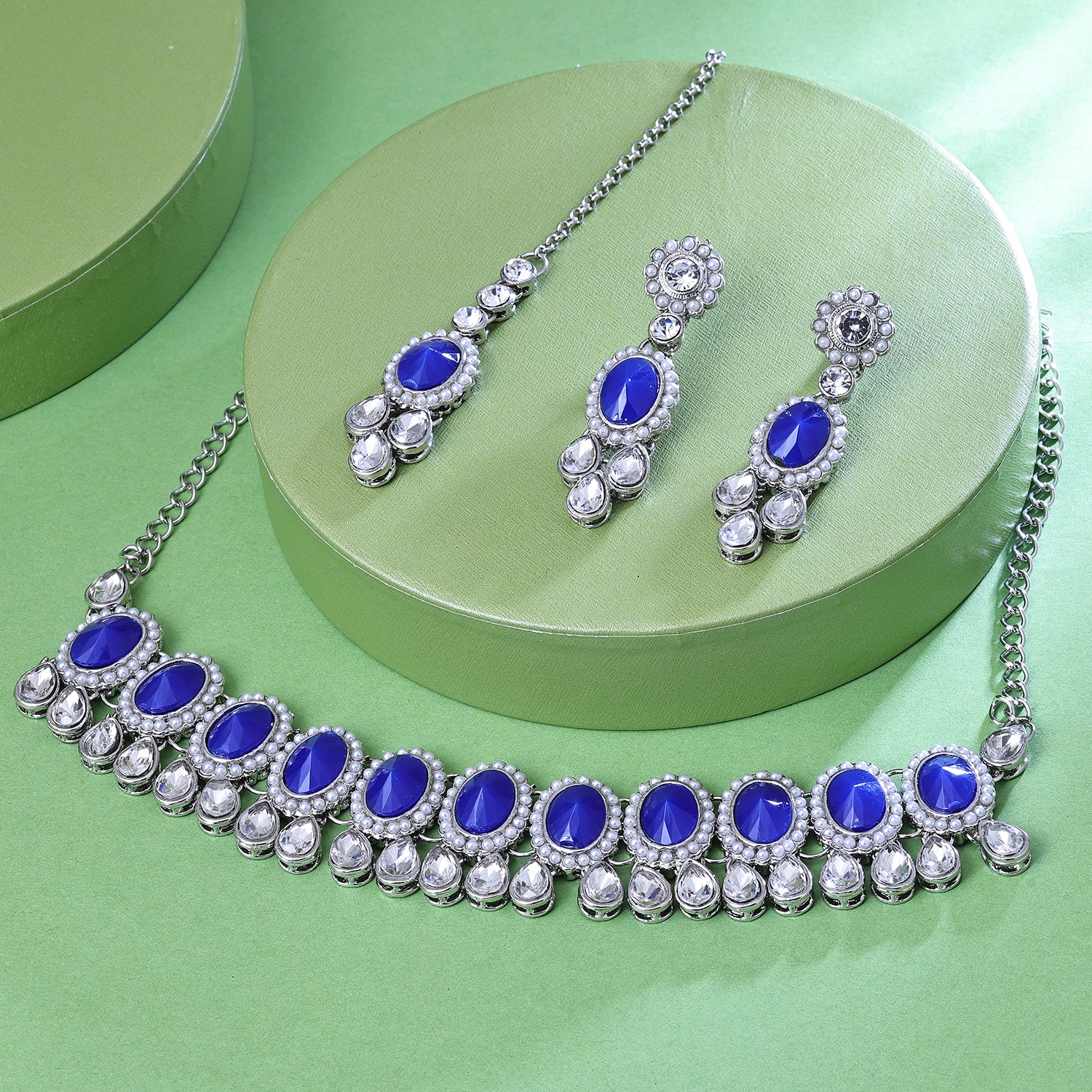 Sukkhi Haunting Rhodium Plated Blue Color Stone Choker Necklace Set With Maang Tikka for Women