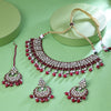 Sukkhi Appealing Gold Plated Maroon Crystal Stone Collar Necklace Set With Maang Tikka for Women