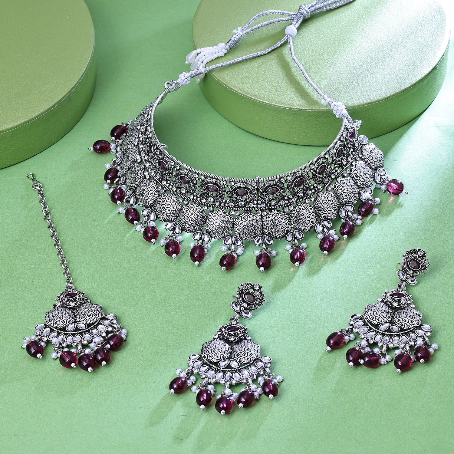 Sukkhi Captivating Rhodium Plated Maroon Color Stone Collar Necklace Set With Maang Tikka for Women