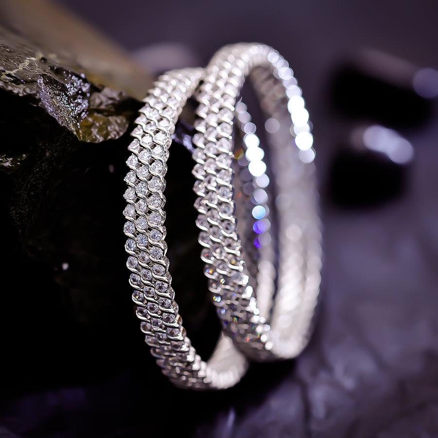 Sukkhi Showy Silver CZ Stone Rhodium Plated Traditional Set Of 4 Bangles for Women