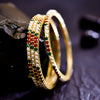 Sukkhi Interesting Multicolor Austrian Stone & Pearl Gold Plated Traditional Set Of 2 Bangles for Women