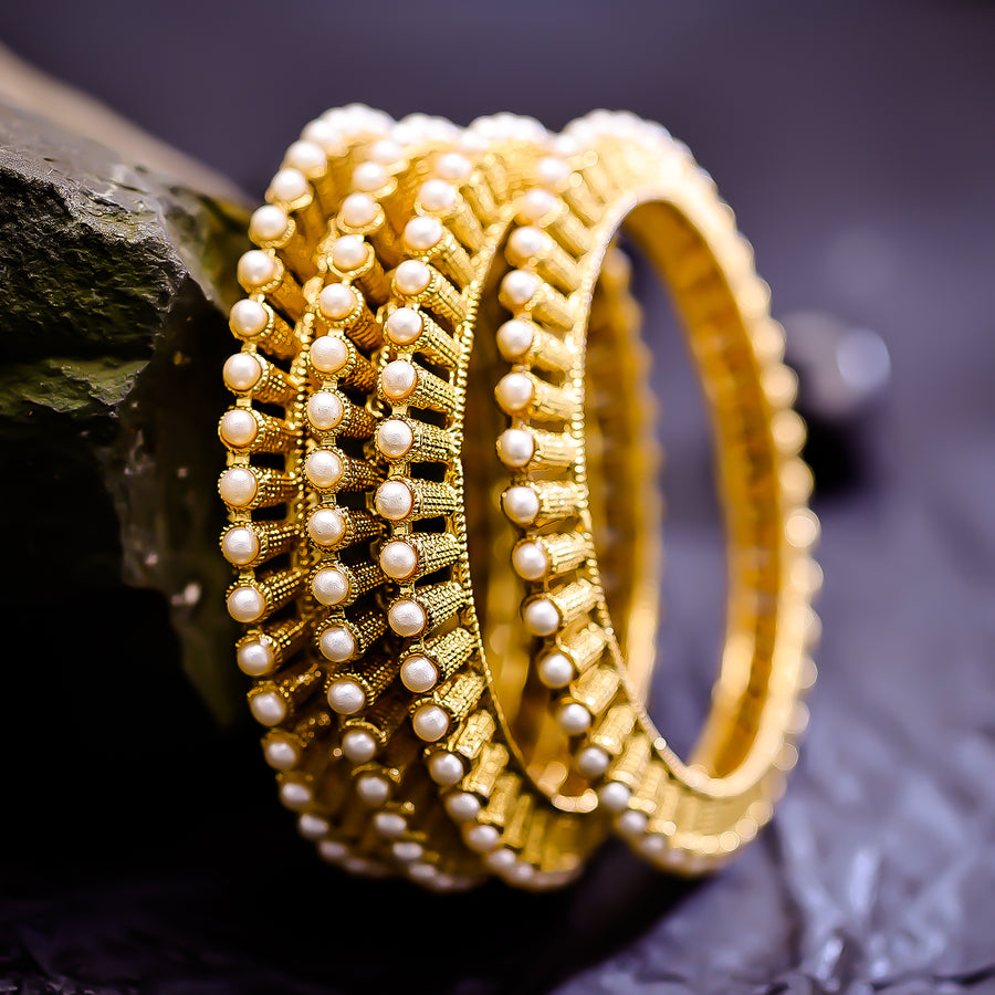 Sukkhi Charismatic Golden Pearl Gold Plated Traditional Set Of 4 Bangles for Women