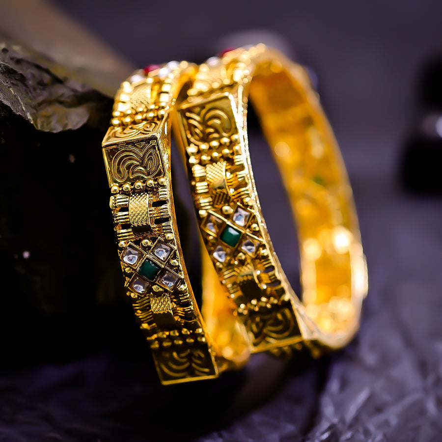 Sukkhi Engaging Multicolor Pearl & Polki Stone Gold Plated Traditional Set Of 2 Bangles for Women