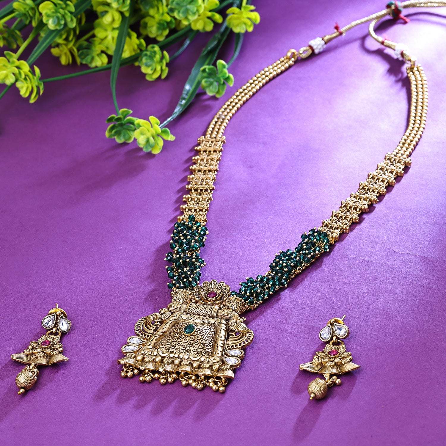 Sukkhi Satisfactory Green And Golden Austrian Stone Gold Plated Traditional Necklace Set for Women
