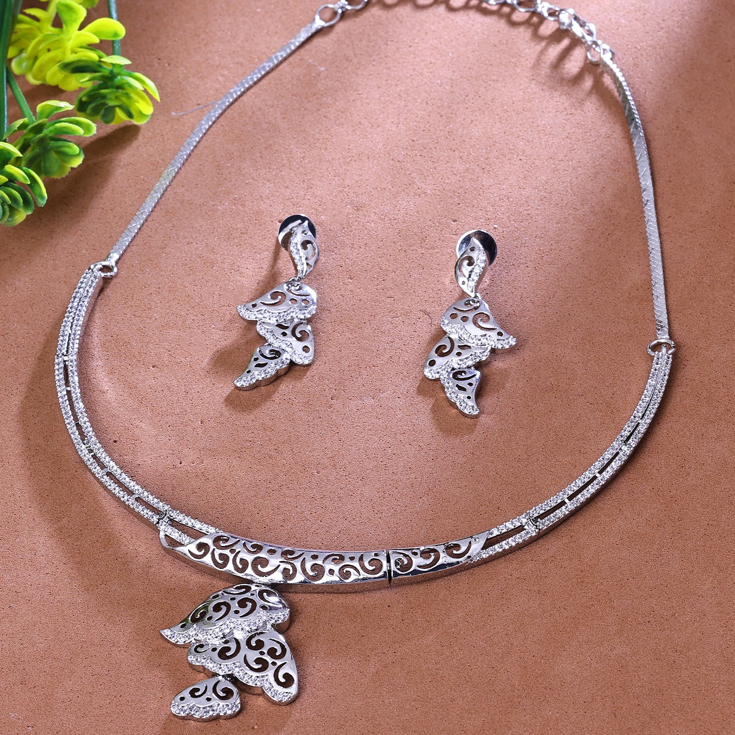 Sukkhi Absorbing Silver CZ Stone Rhodium Plated Traditional Necklace Set for Women