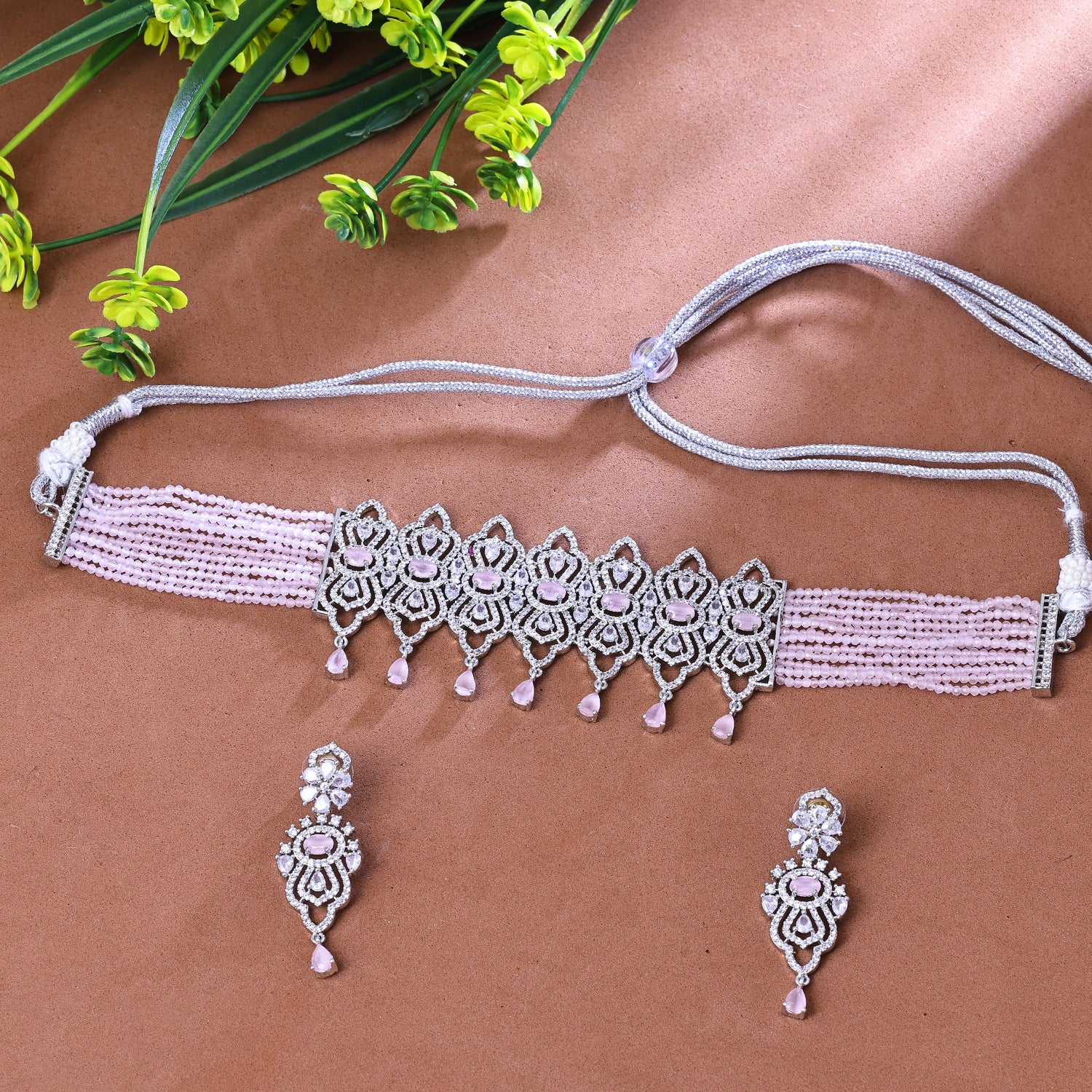 Sukkhi Engaging Light Pink And Silver CZ Stone Rhodium Plated Traditional Necklace Set for Women