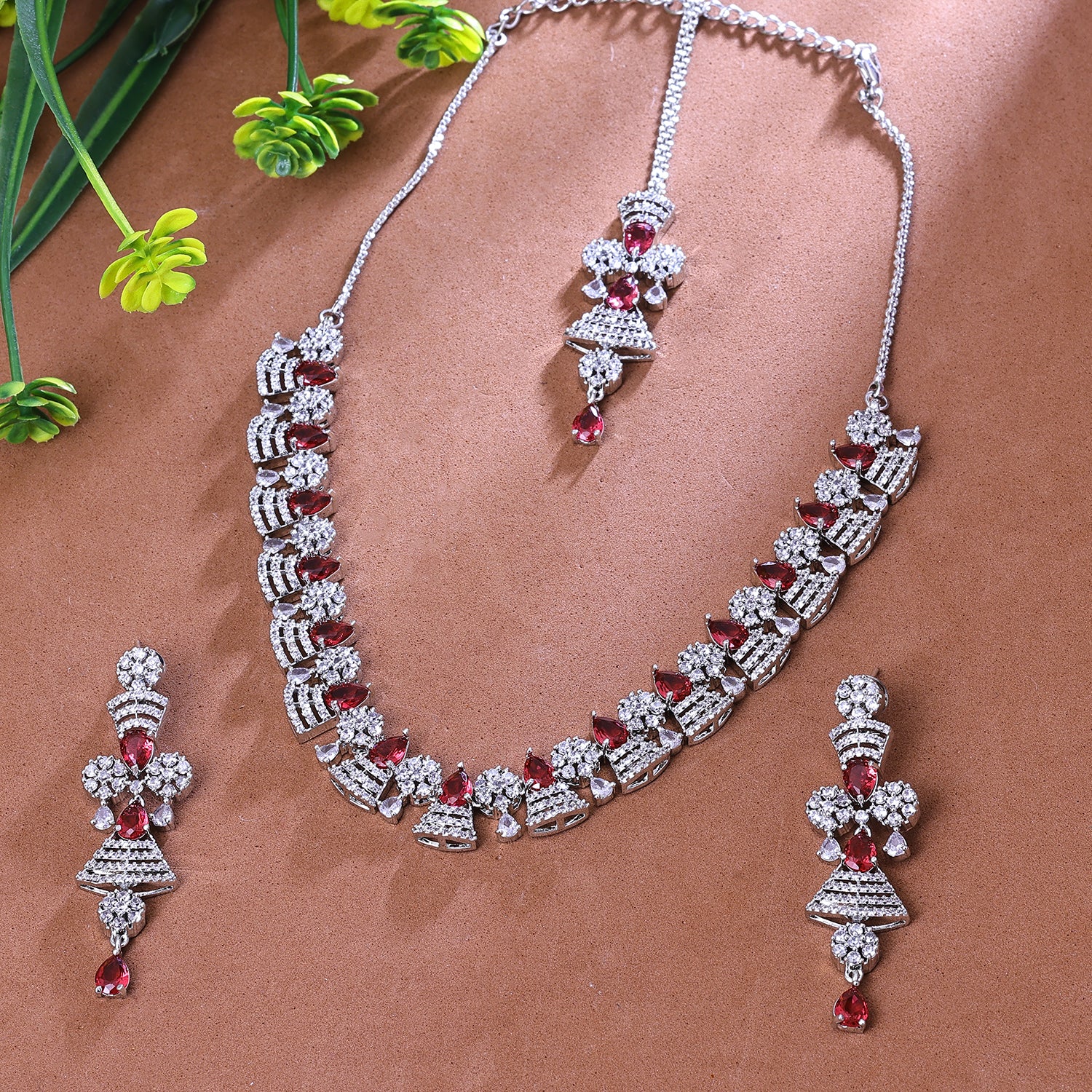 Sukkhi Fair Red And Silver Austrian Stone Rhodium Plated Traditional Necklace Set With Maang Tikka for Women