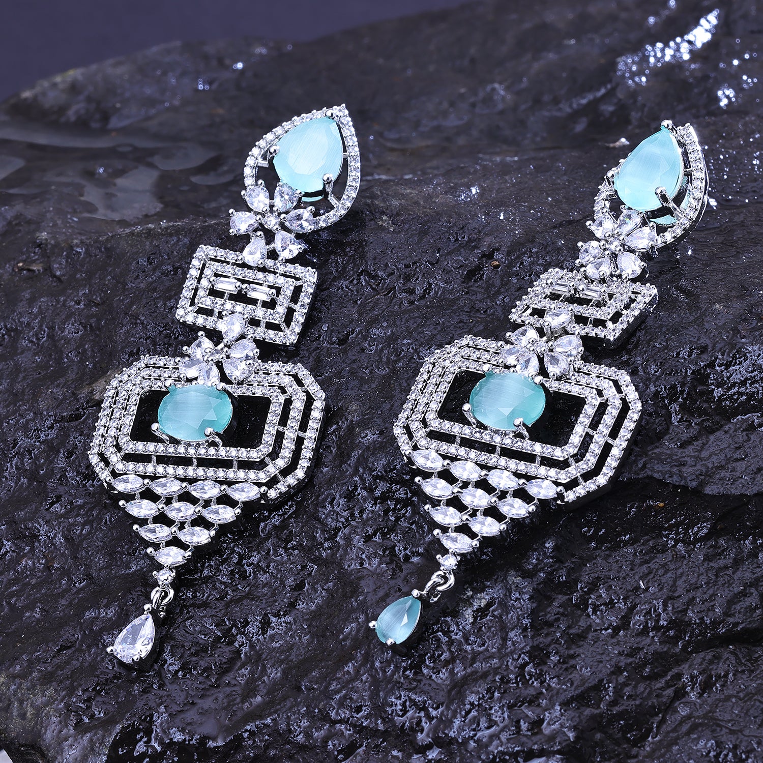 Sukkhi Resplendent Aqua Green And Silver Color Stone Rhodium Plated Dangler Earrings for Women