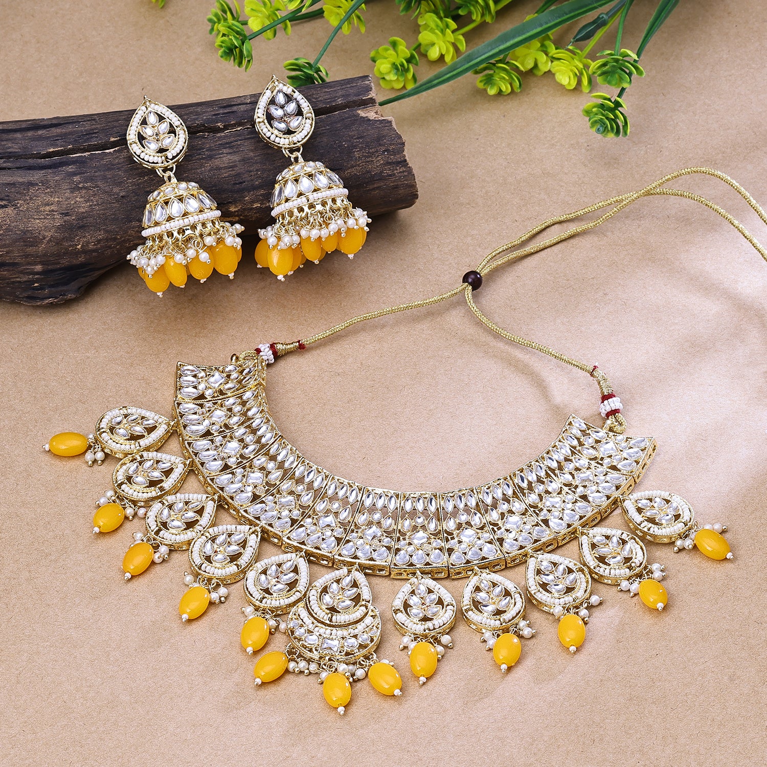 Sukkhi Riveting Yellow Kundan Gold Plated Traditional Necklace Set for Women