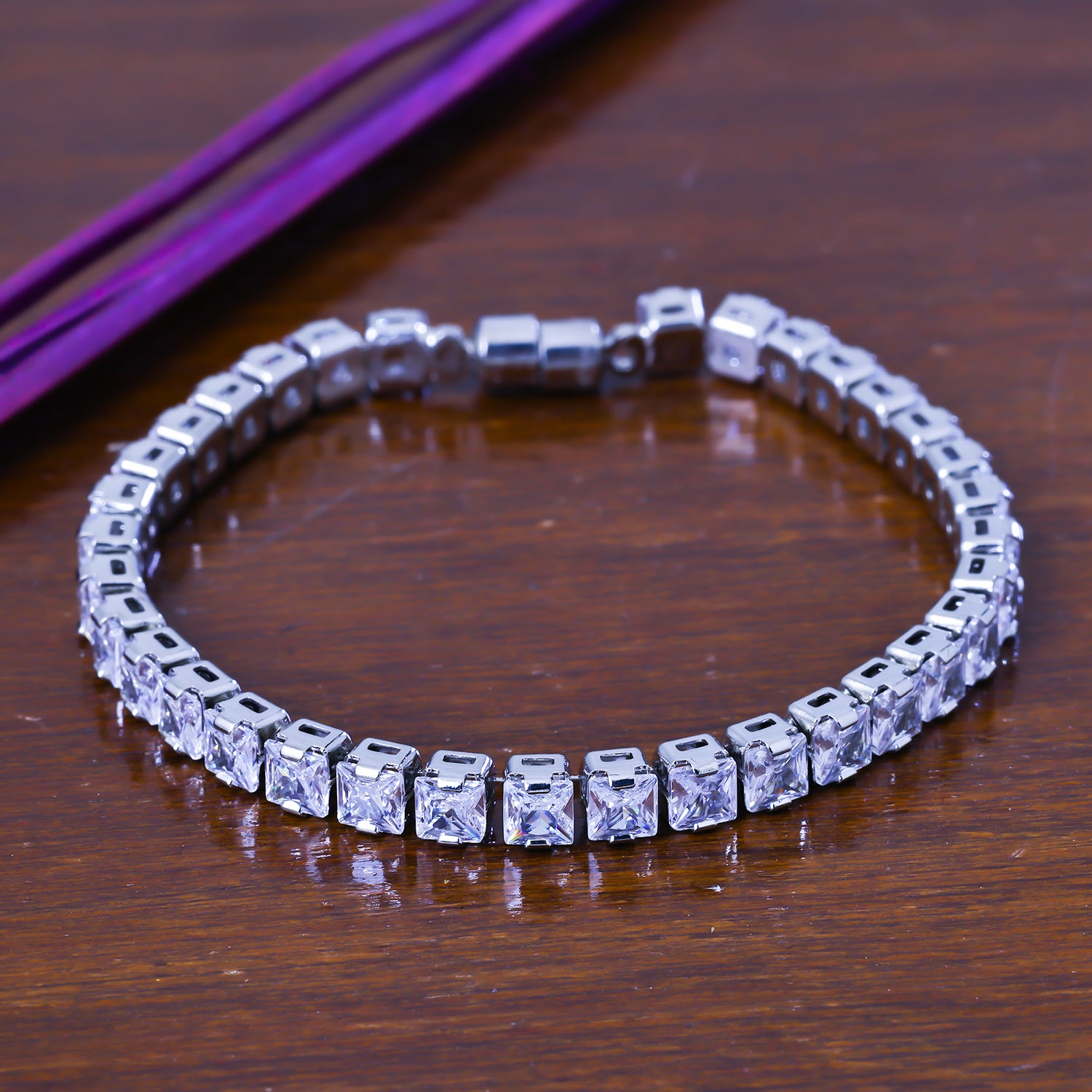 Sukkhi Pleasing Silver CZ Stone Rhodium Plated Party Wear Bracelet for Women