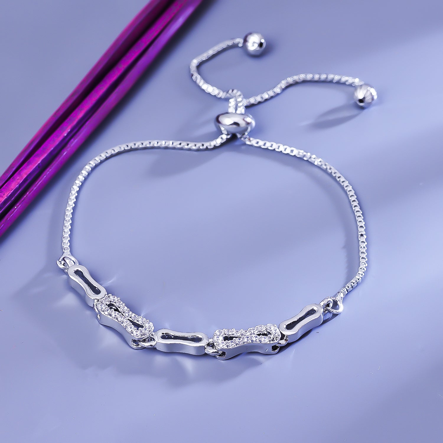 Sukkhi Entrancing Silver CZ Stone Rhodium Plated Party Wear Bracelet for Women