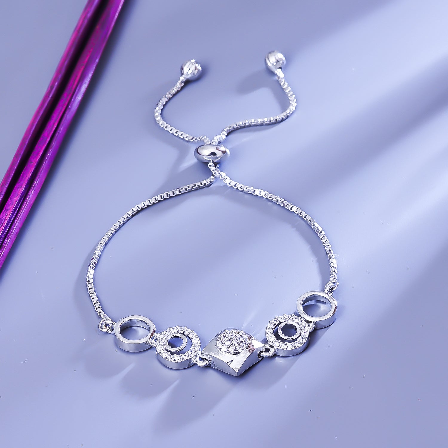 Sukkhi Fetching Silver CZ Stone Rhodium Plated Party Wear Bracelet for Women