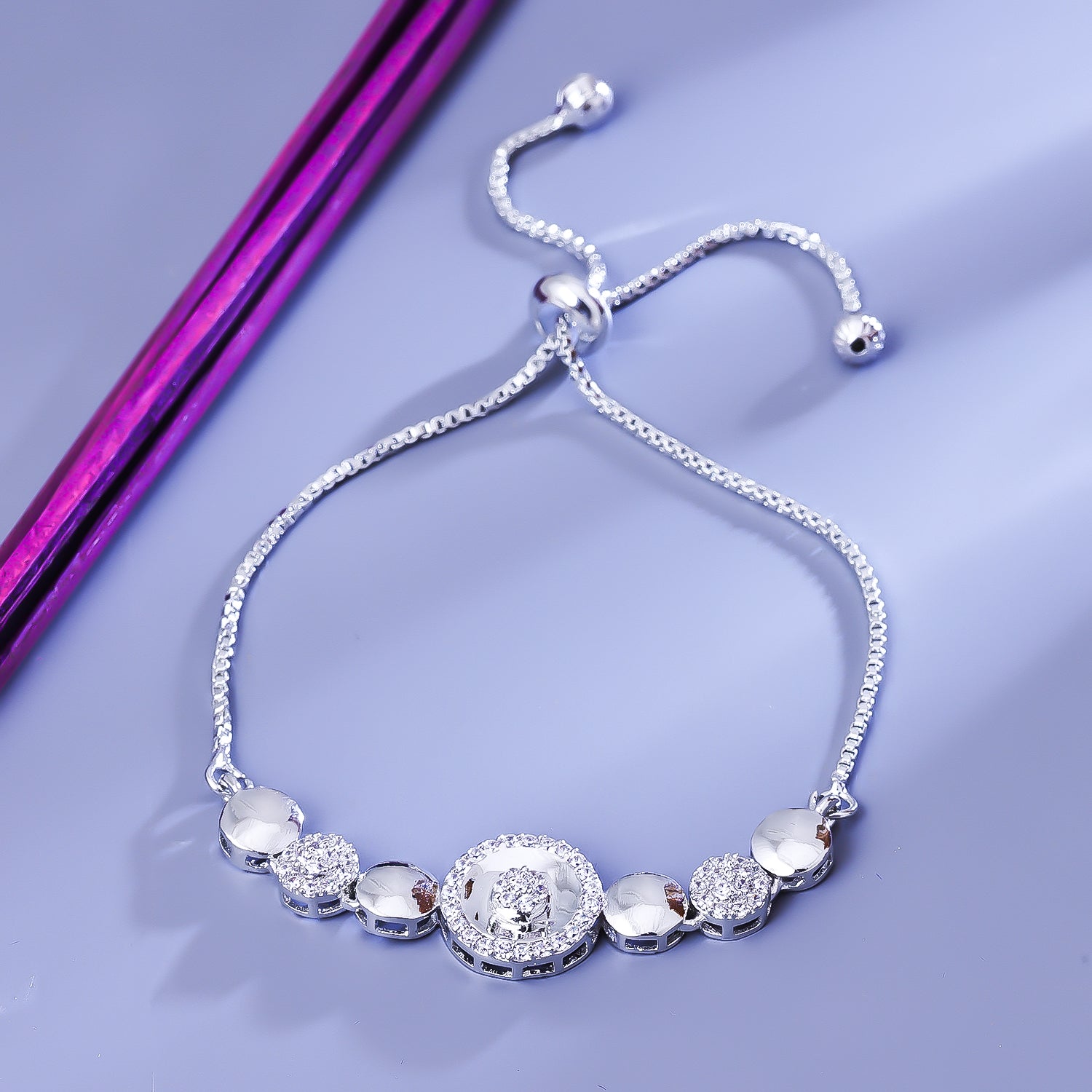 Sukkhi Magnetic Silver CZ Stone Rhodium Plated Party Wear Bracelet for Women