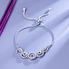 Sukkhi Cute Silver CZ Stone Rhodium Plated Party Wear Bracelet for Women