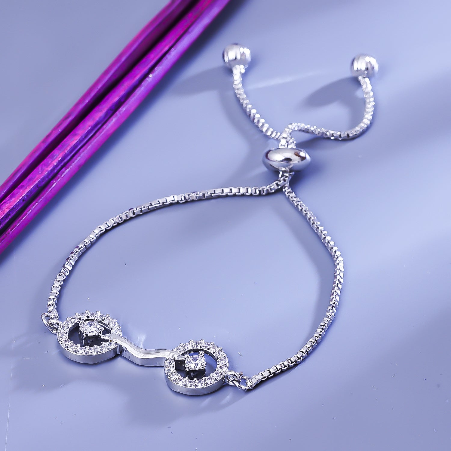 Sukkhi Drop-Dead Silver CZ Stone Rhodium Plated Party Wear Bracelet for Women