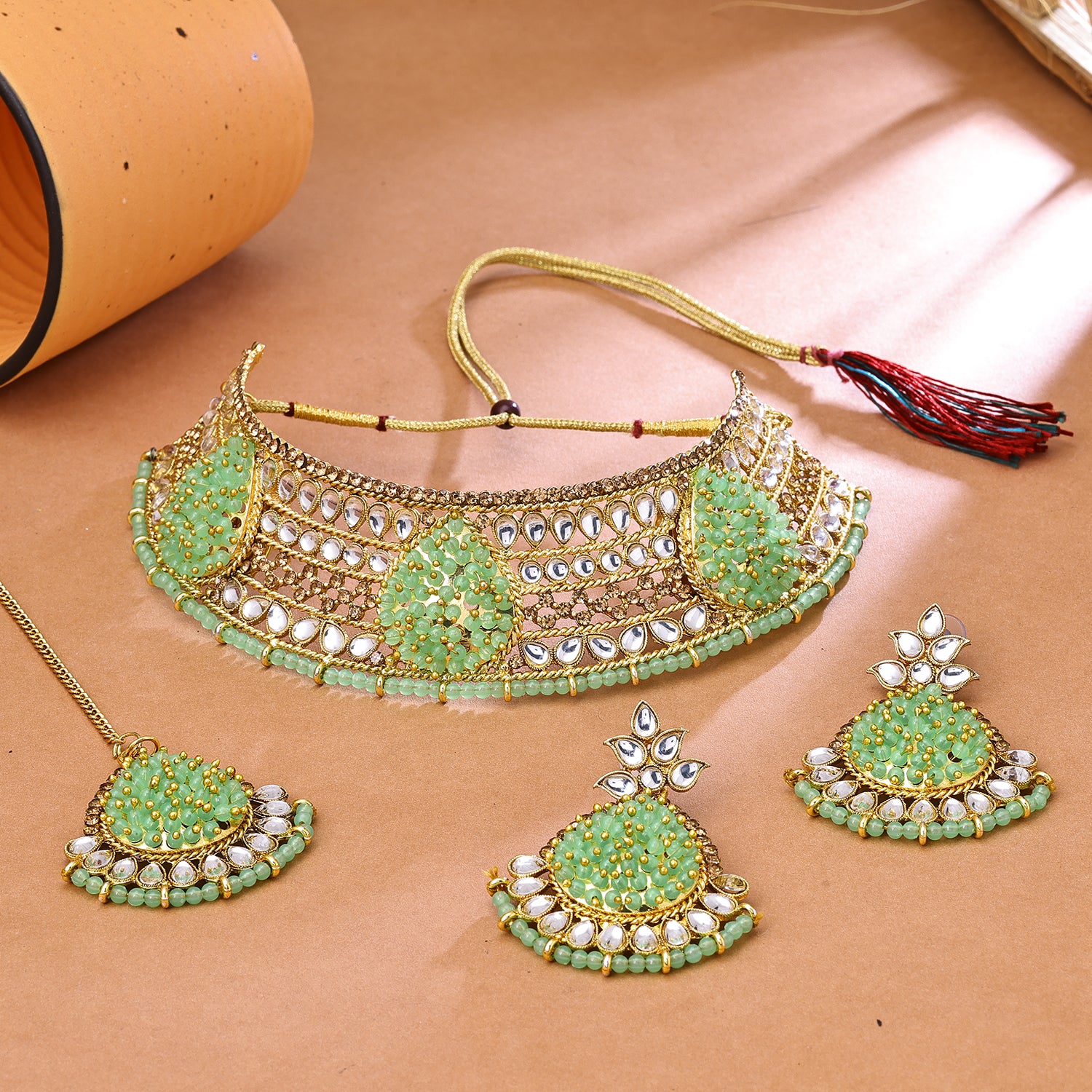 Can you please recommend a few jewelry stores in Gurgaon/Delhi where I can  buy jewelry like this? I am trying to style a pista green lehenga for a  Sangeeth! How much can