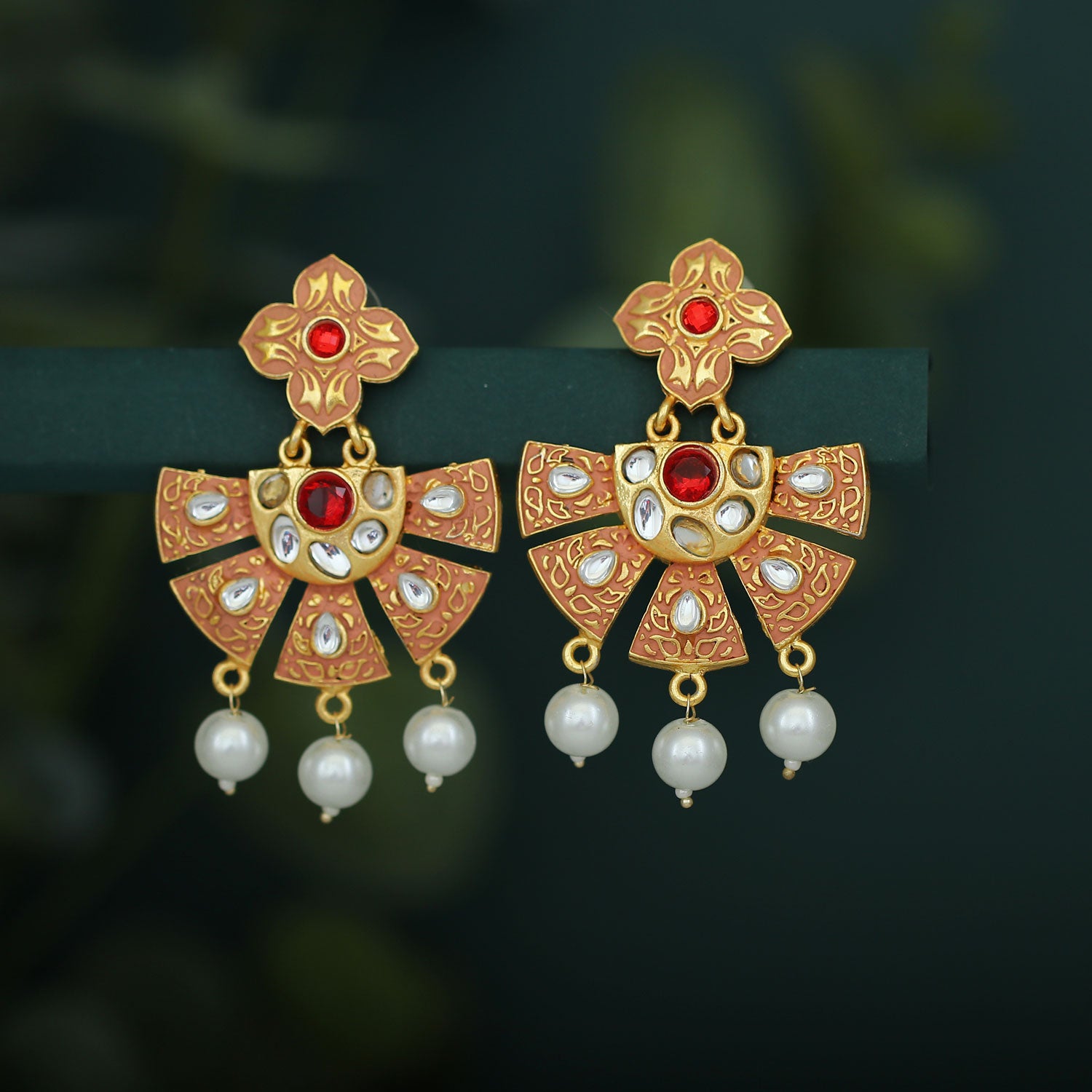 Sukkhi Arresting Gold Plated Golden Reversible Stone Jhumki Earrings f -  Sukkhi.com