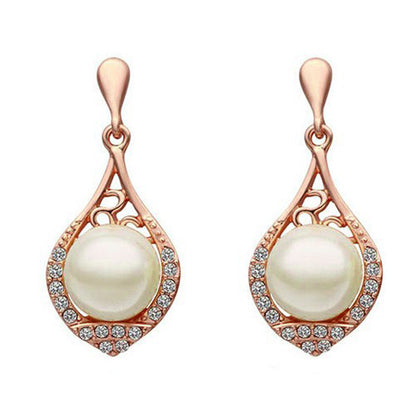 Scintillare by Sukkhi Lavish Rhodium and Rose Gold Plated Crystals from Swarovski Dangle Pair of 3 Earring Combo For Women