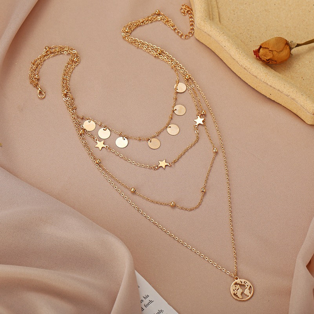 Scintillare by Sukkhi Dazzling Gold Plated Star Inspired Multi Layered Necklace for Women