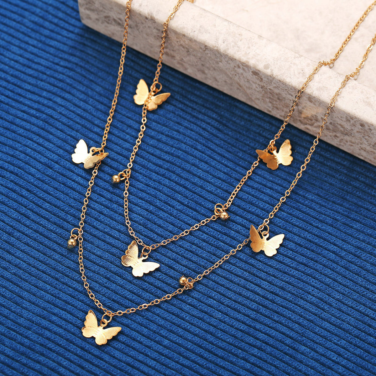 Scintillare by Sukkhi Adorable Gold Plated Multi Layered Butterfly Necklace for Women