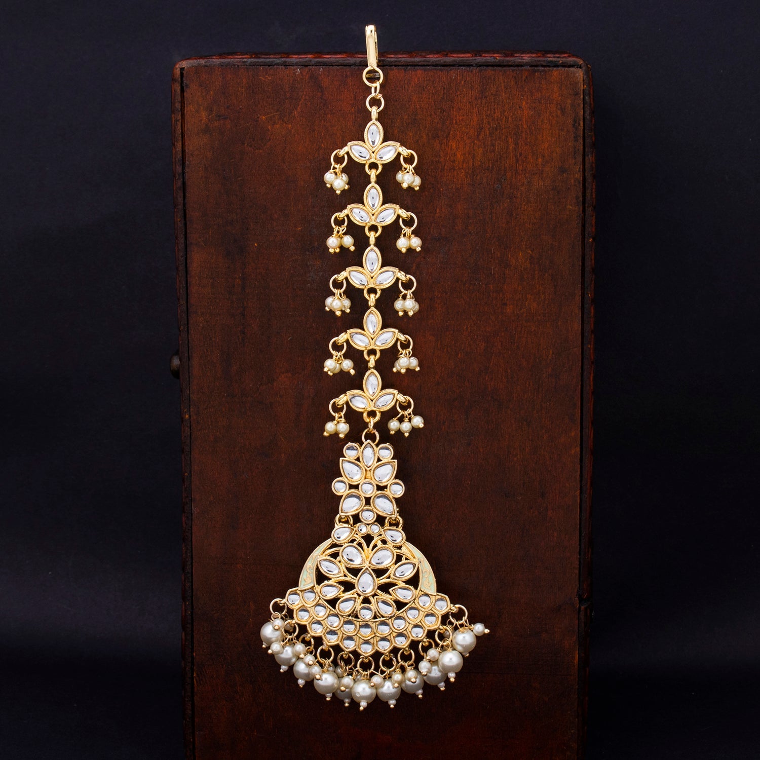 Sukkhi Stunning Gold Plated Kundan Mangtikka For Women