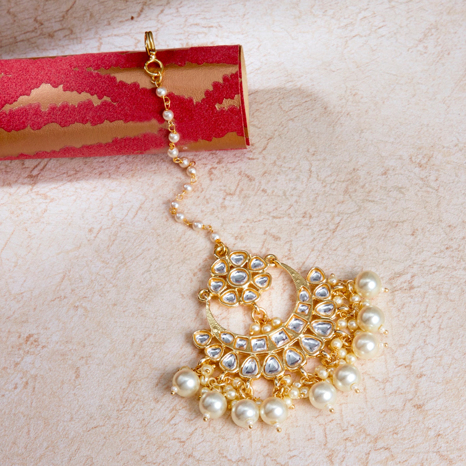 Sukkhi Luxurious Pearl Gold Plated Kundan Maangtikka Worn By Karisma Kapoor